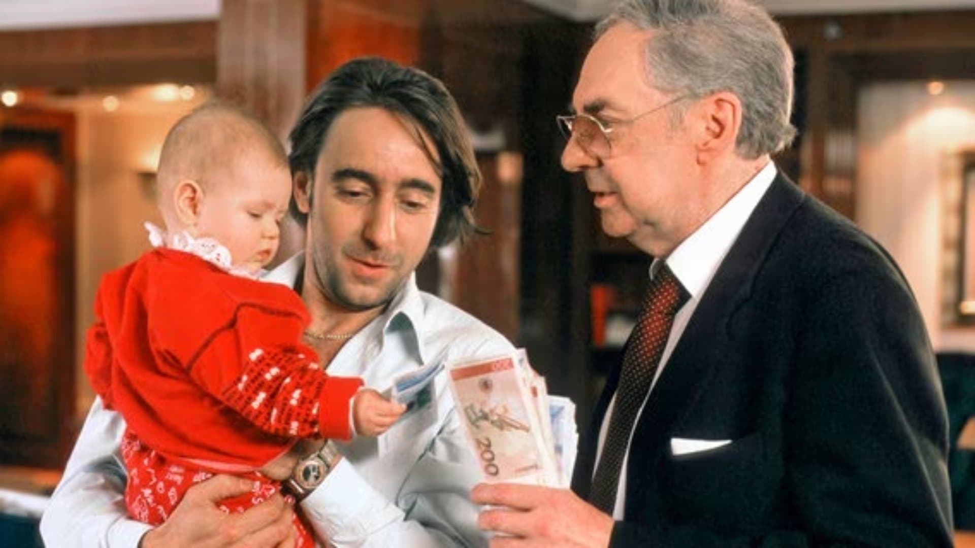 Backdrop for Drei Gauner, ein Baby und die Liebe
